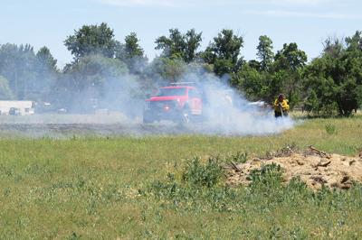 Crews put out grass fire in town