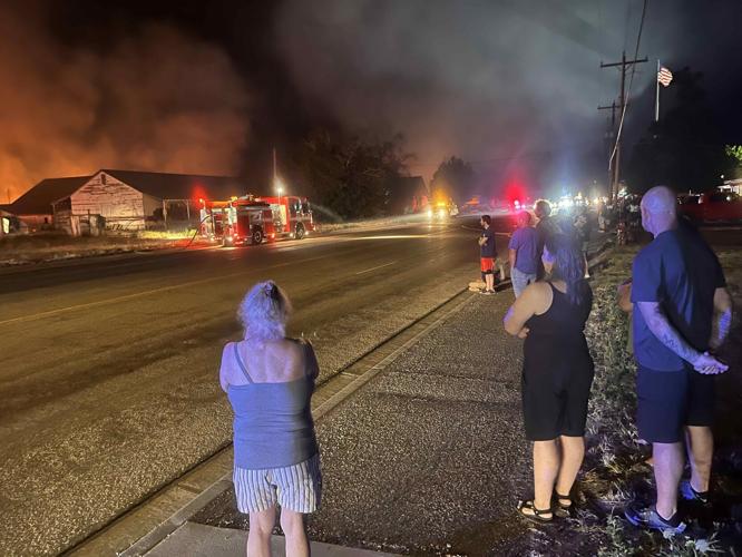 Dozens of citizens crowd around fire across from Fruitland City Hall