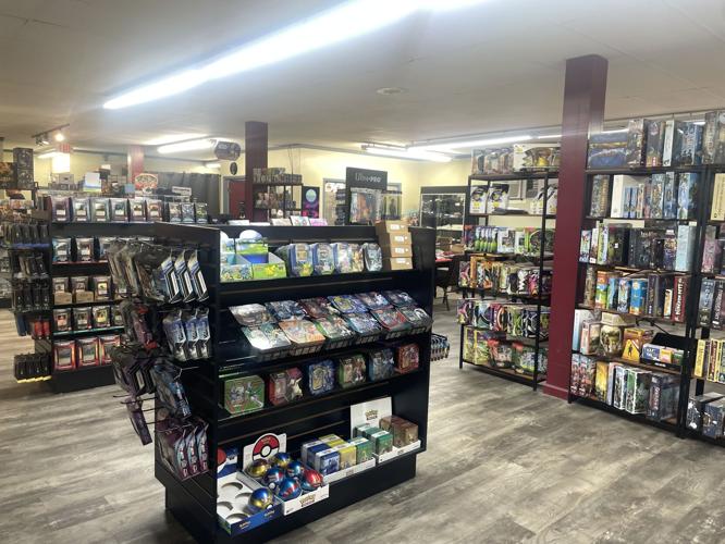 Chamber Kitchen Table Games & Bistro with ribbon cutting