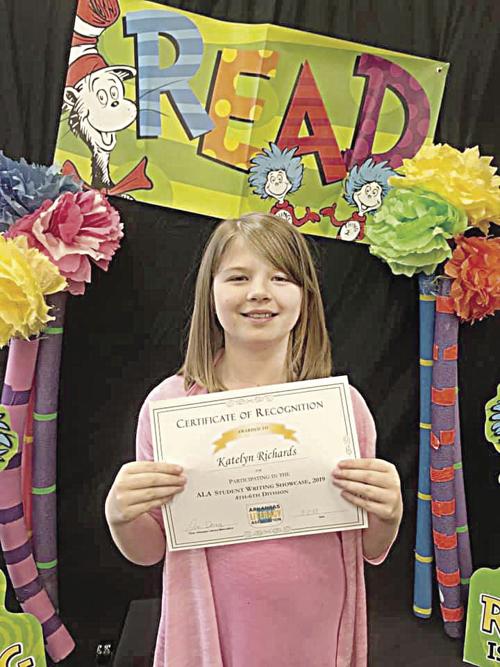 Richards recognized as author at event