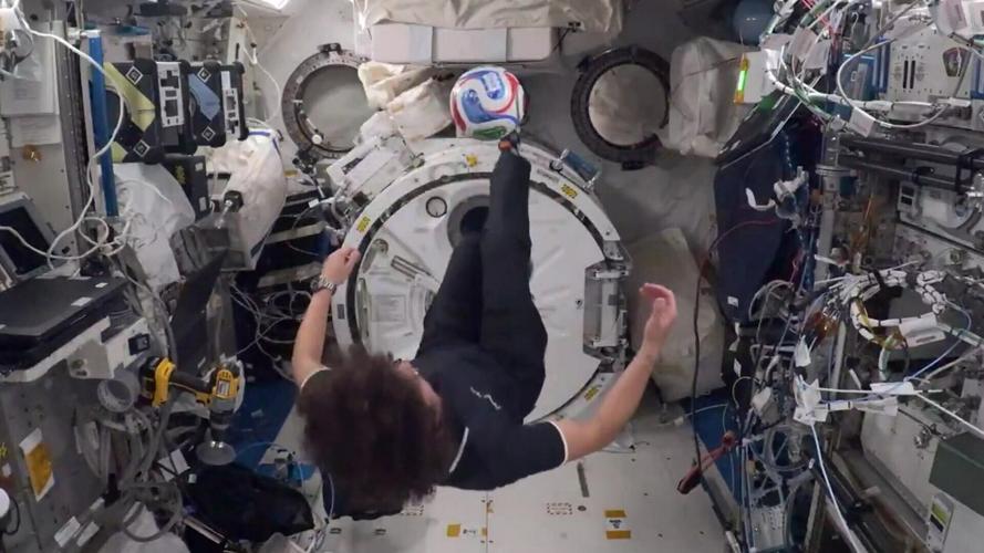 Astronaut does bicycle kick in space during soccer science lesson ...