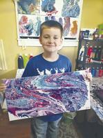 Father, son bond over painting pastime