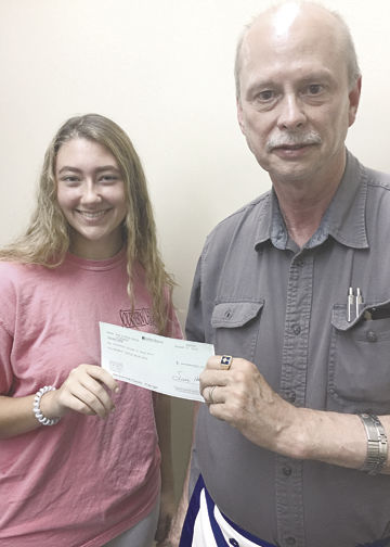 Kaitlin Belle Hicks receives first half of scholarship