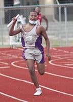 Runners race at Crossett track and field event