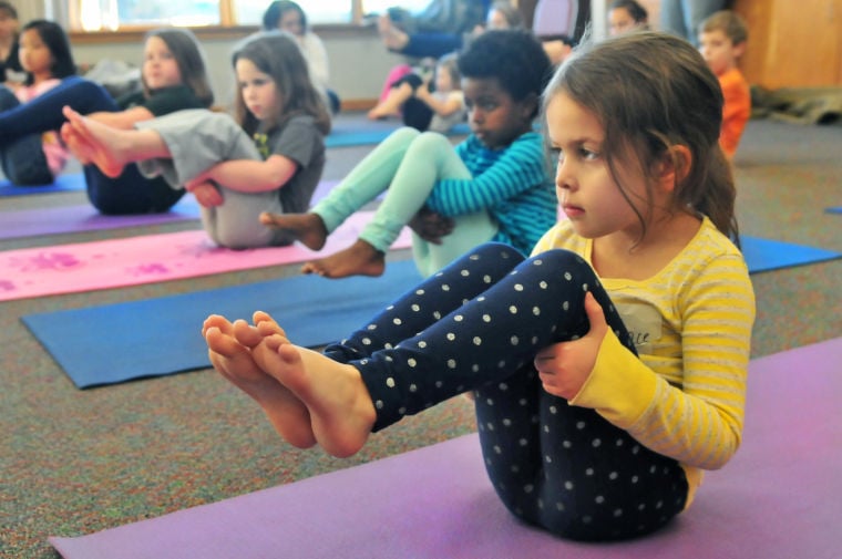 Library helps kids combat cabin fever with yoga | News ...