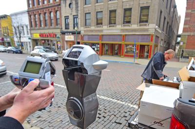 Card readers placed on some Court Street parking meters ...