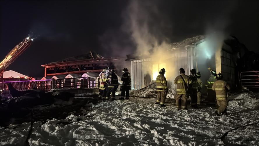 Departments battle two-alarm fire at Cayuga County barn
