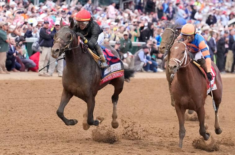 Golden Tempo (left), ridden by jockey Jose Ortiz, won the 152nd Kentucky Derby, May 2, 2026.