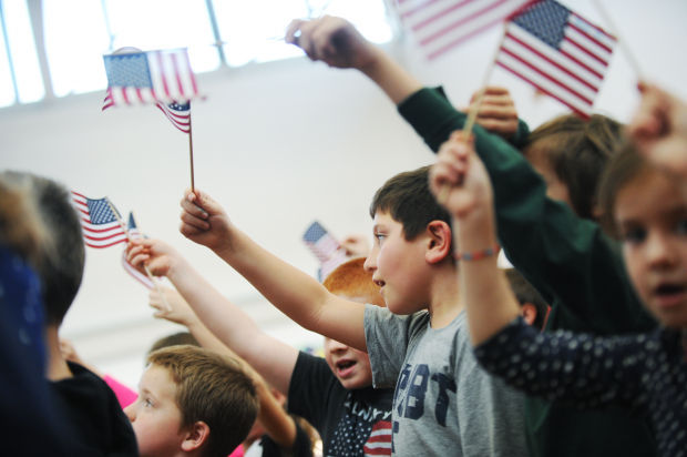 Owasco Elementary students honor veterans in school ceremony