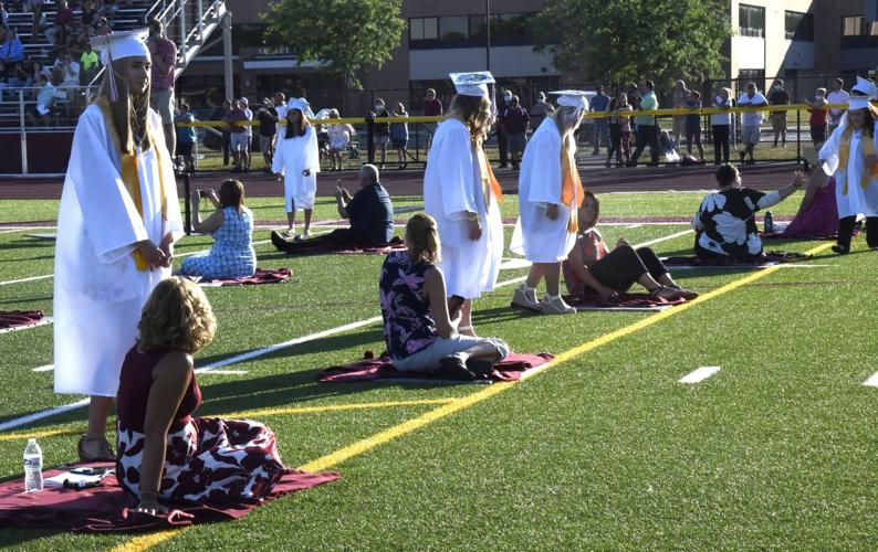 Port Byron High School seniors gather outdoors for graduation ceremony
