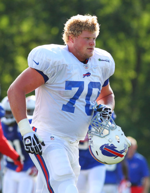 Buffalo Bills defensive tackle Kyle Williams (95) takes part in drills  during their NFL football training camp in Pittsford, N.Y., Tuesday, July  22, 2014. (AP Photo/Bill Wippert Stock Photo - Alamy