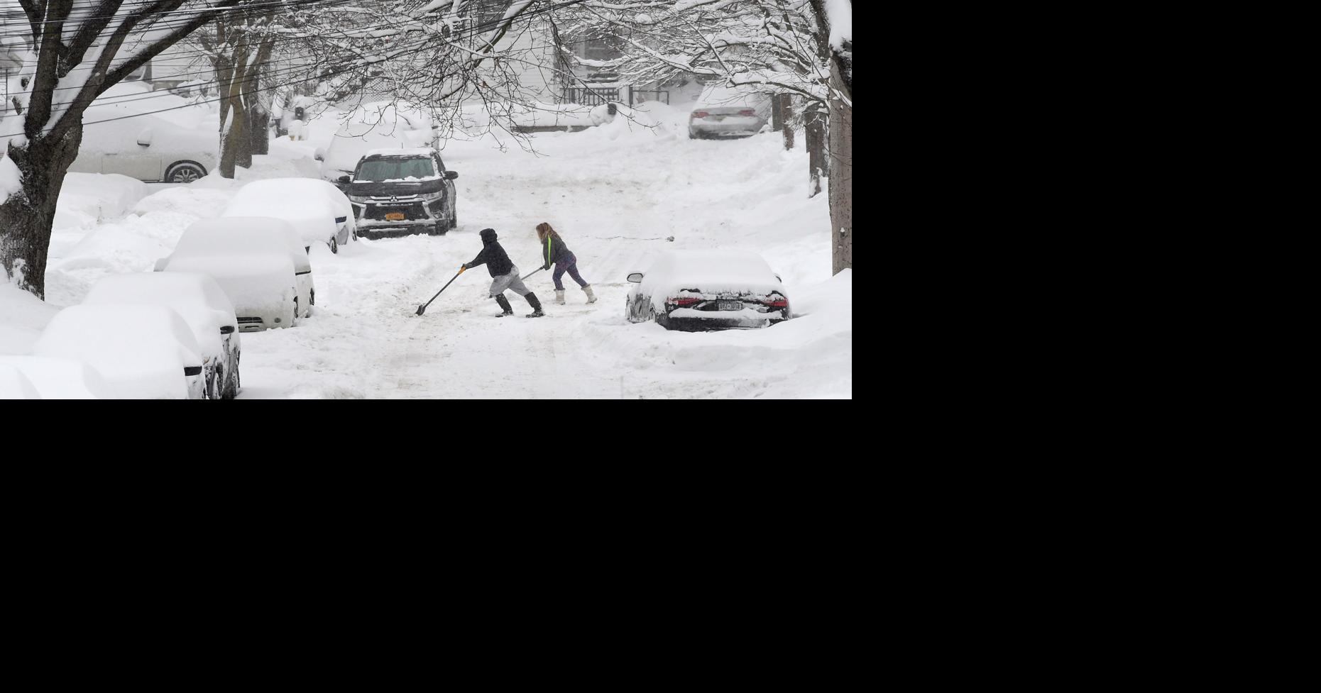 Gallery: Residents dig out after storm drops more than foot of snow in ...