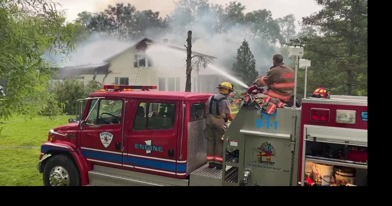 Multiple fire departments battle a house fire in Scipio