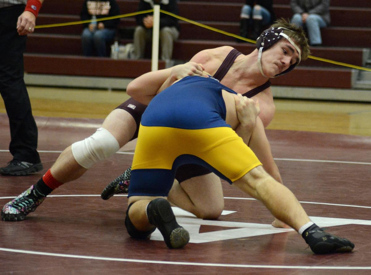 Auburn wrestling team wins eight matches in victory over West Genesee