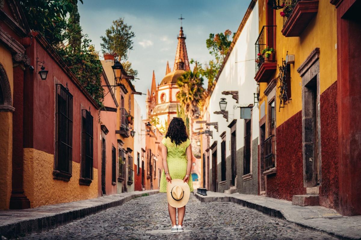 San Miguel de Allende, Mexico, stands out for its cobblestone streets adorned with candy-colored houses and its ornate church in the town square.