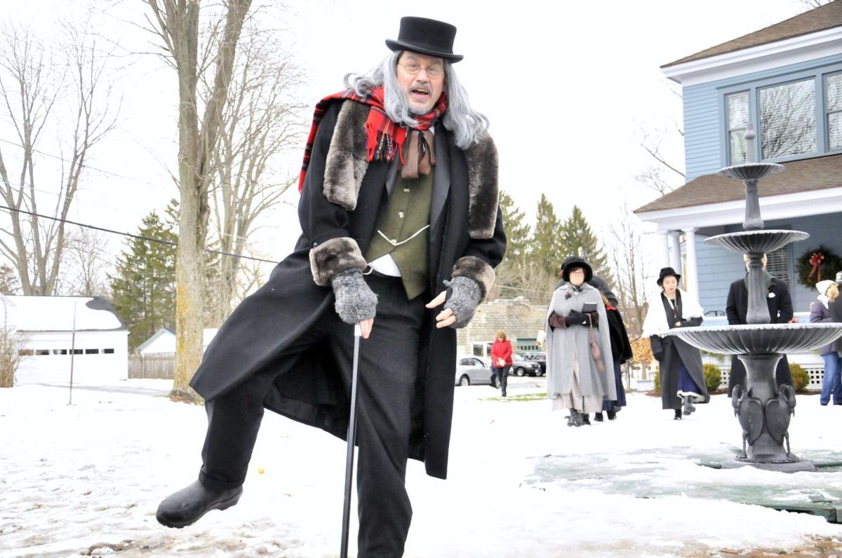 scrooge spreads christmas cheer on final day of dickens skaneateles christmas