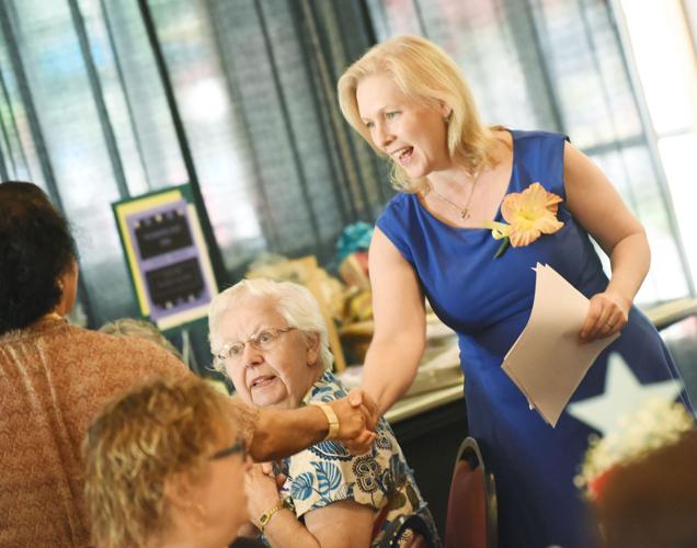 Gillibrand encourages women to speak out, touts paid leave bill at NYS