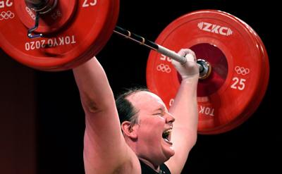 New Zealand's Laurel Hubbard, the first transgender Olympian, can't make the lift on her final try in the women's 87 kg weightlifting final at the 2020 Tokyo Olympics on August 2, 2021, in Tokyo.
