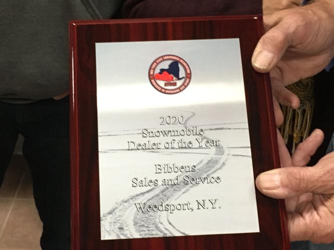 Distinguished dealer Weedsport snowmobile biz wins state award