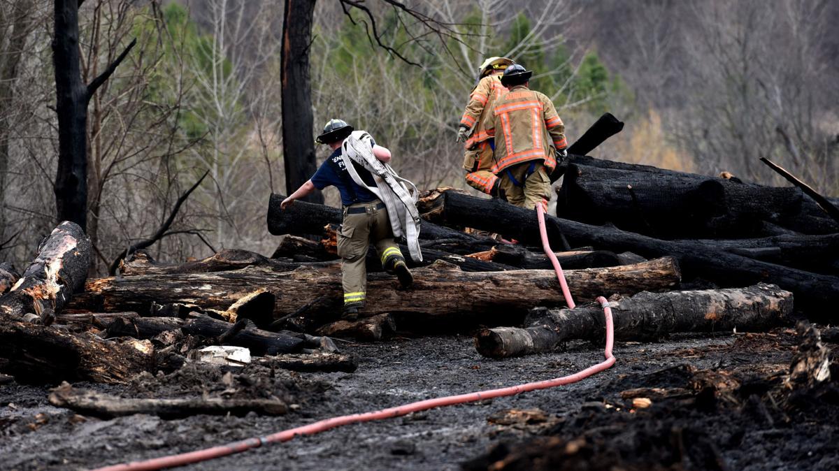 Fire departments called back to large lumber fire in Local