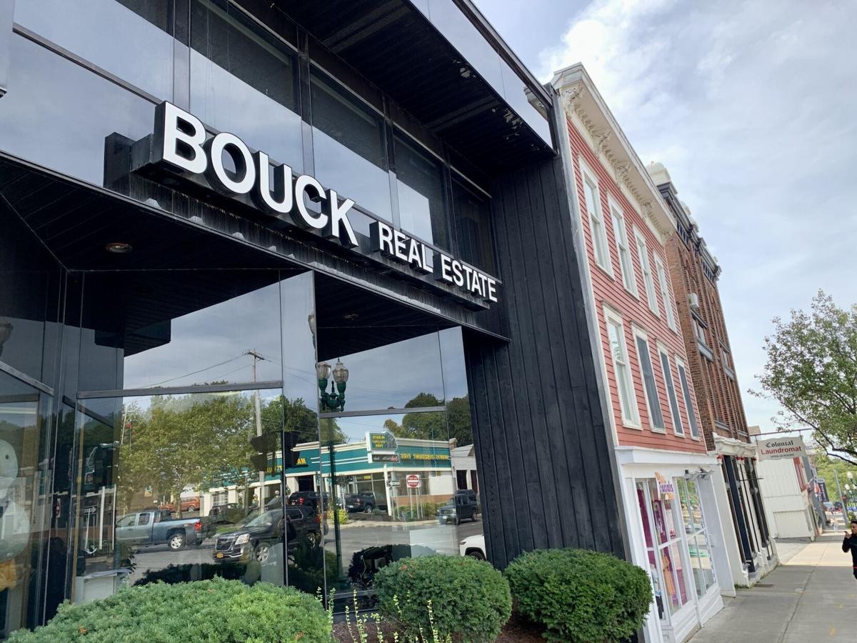 Auburn agency acquires longtime real estate firm