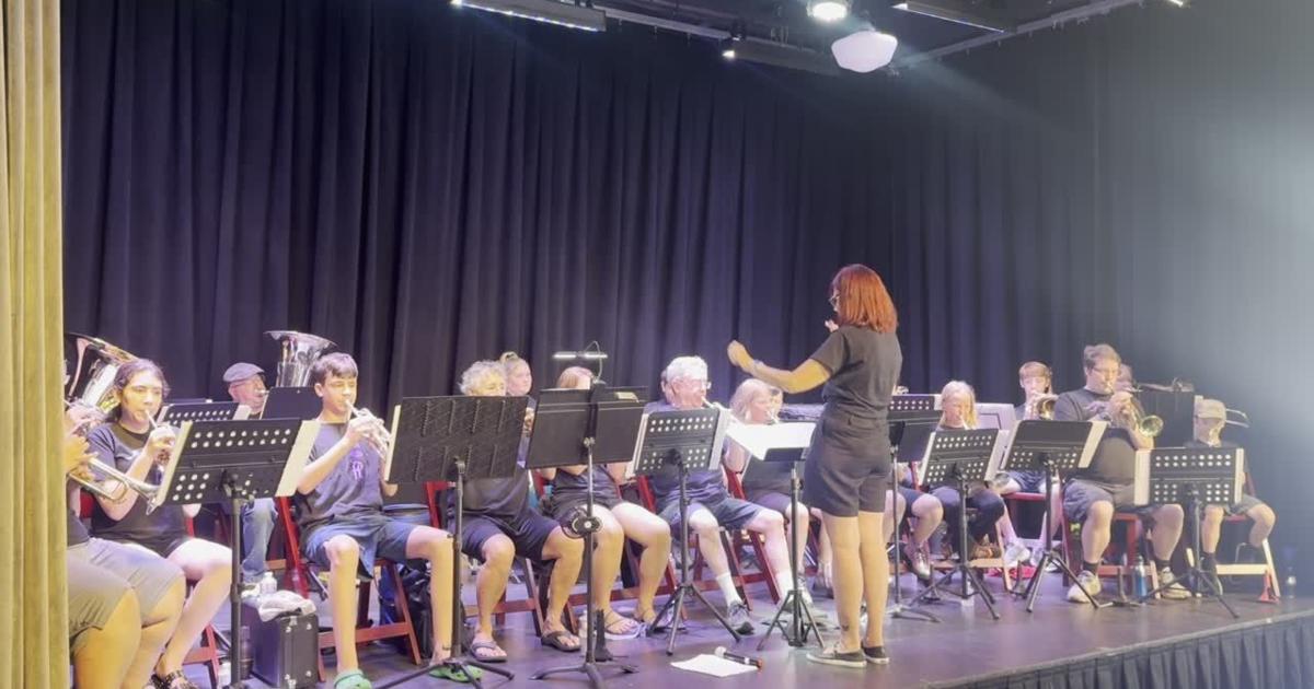 Purple Lancers perform national anthem at carriage house in Auburn