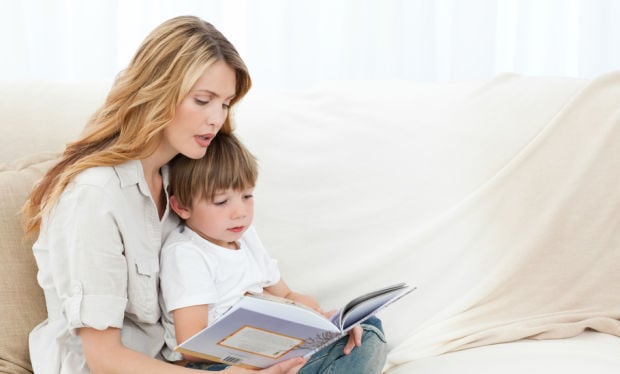 Mother reading to son