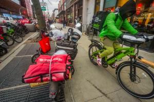 Under pressure from cities, DoorDash steps up efforts to ensure its drivers don’t break traffic laws