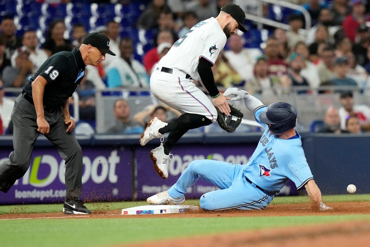 Clement and Springer hit RBI singles in the 8th in the Blue Jays' 2-0 win  over the Marlins