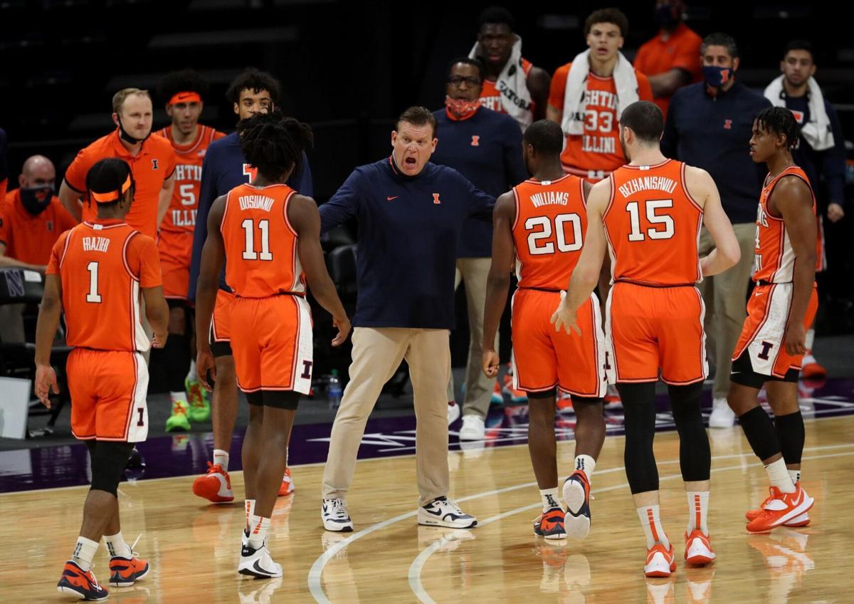 Illinois coach Brad Underwood talks with his players in the first half against Northwestern on January 7, 2021, at Welsh- Ryan Arena in Evanston, Illinois.
