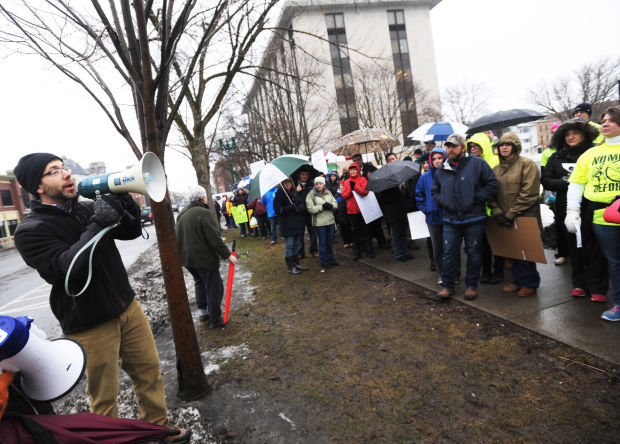 Teachers, parents and students march in Auburn to protest ...