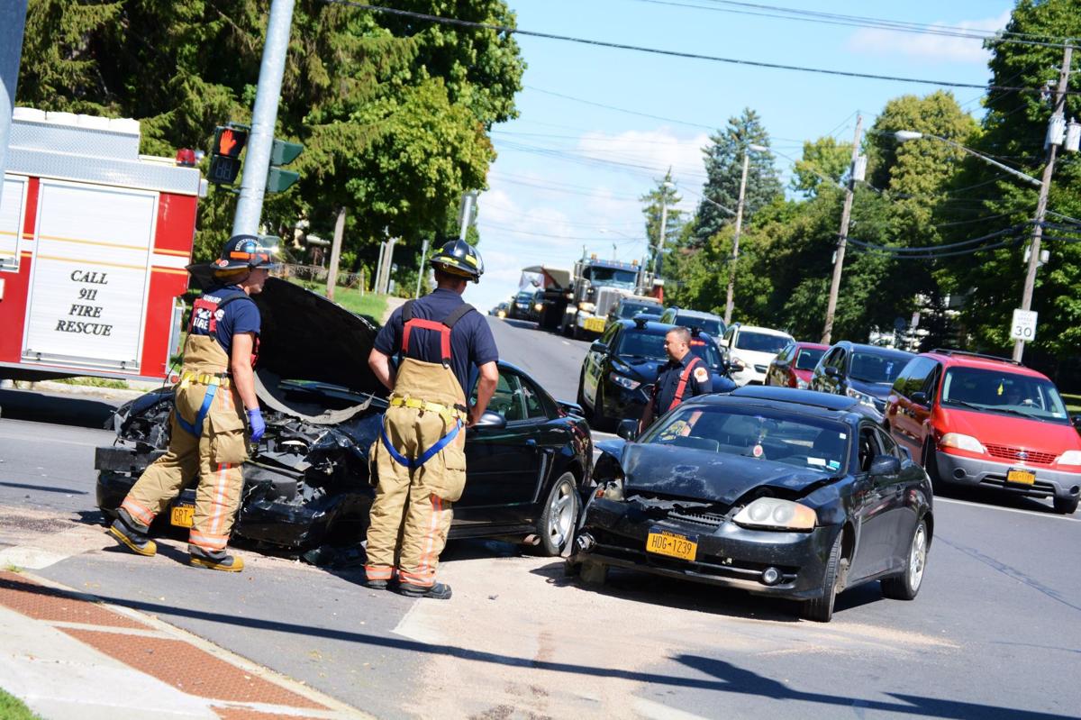 One driver taken to hospital after cars collide at Auburn intersection