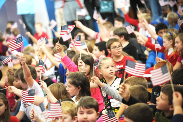 Owasco Elementary students honor veterans in school ceremony