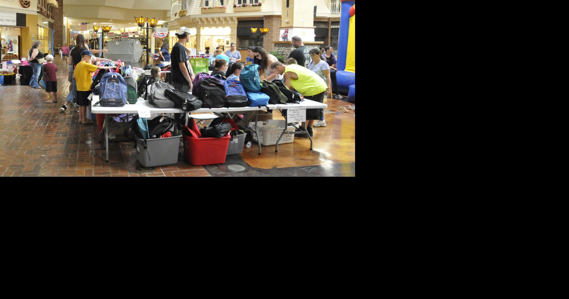 'A huge relief' Cayuga County families get school supplies at giveaway