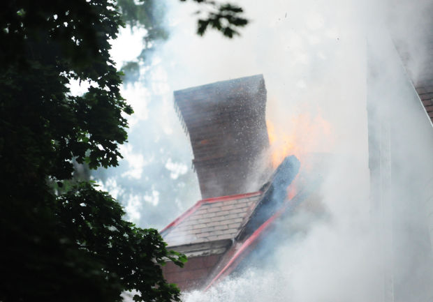 Historic Cayuga home goes up in flames