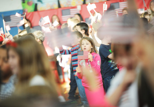 Owasco Elementary students honor veterans in school ceremony