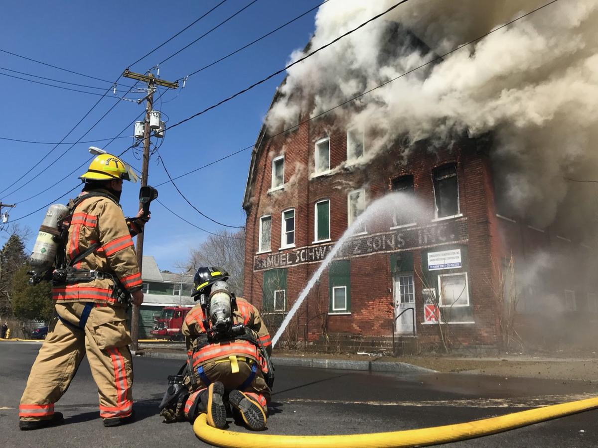 Firefighters combat fire, smoke at vacant building in Auburn Local