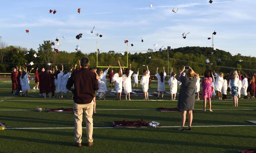 Port Byron High School seniors gather outdoors for graduation ceremony