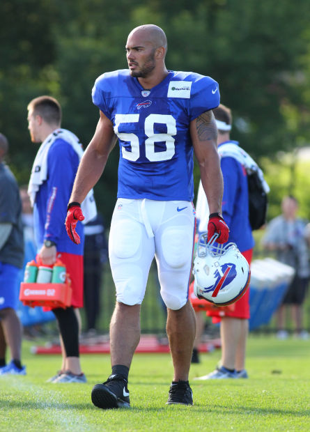 Buffalo Bills defensive tackle Kyle Williams (95) takes part in drills  during their NFL football training camp in Pittsford, N.Y., Tuesday, July  22, 2014. (AP Photo/Bill Wippert Stock Photo - Alamy