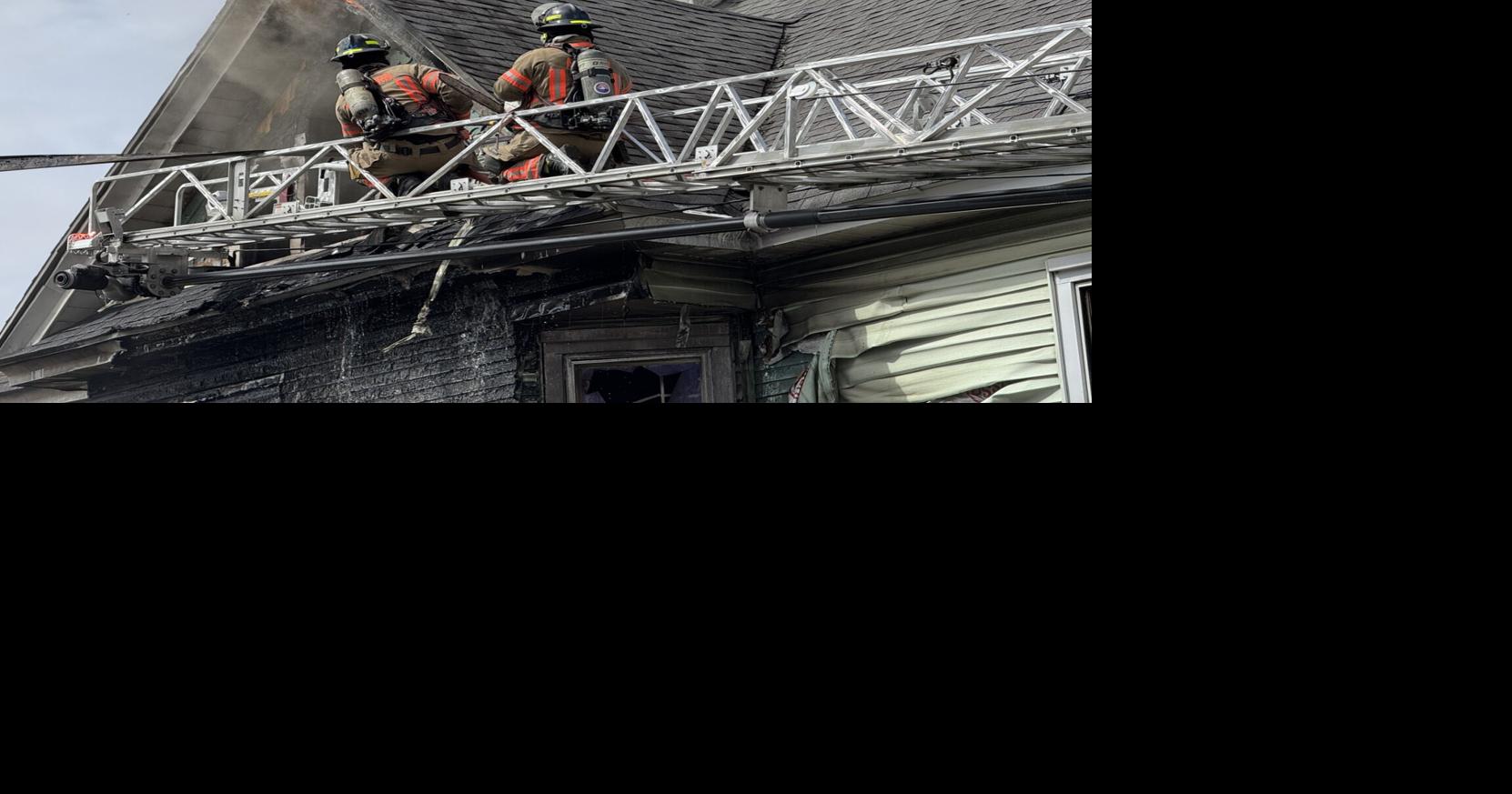 Dog dies in house fire in Auburn, two people rescued