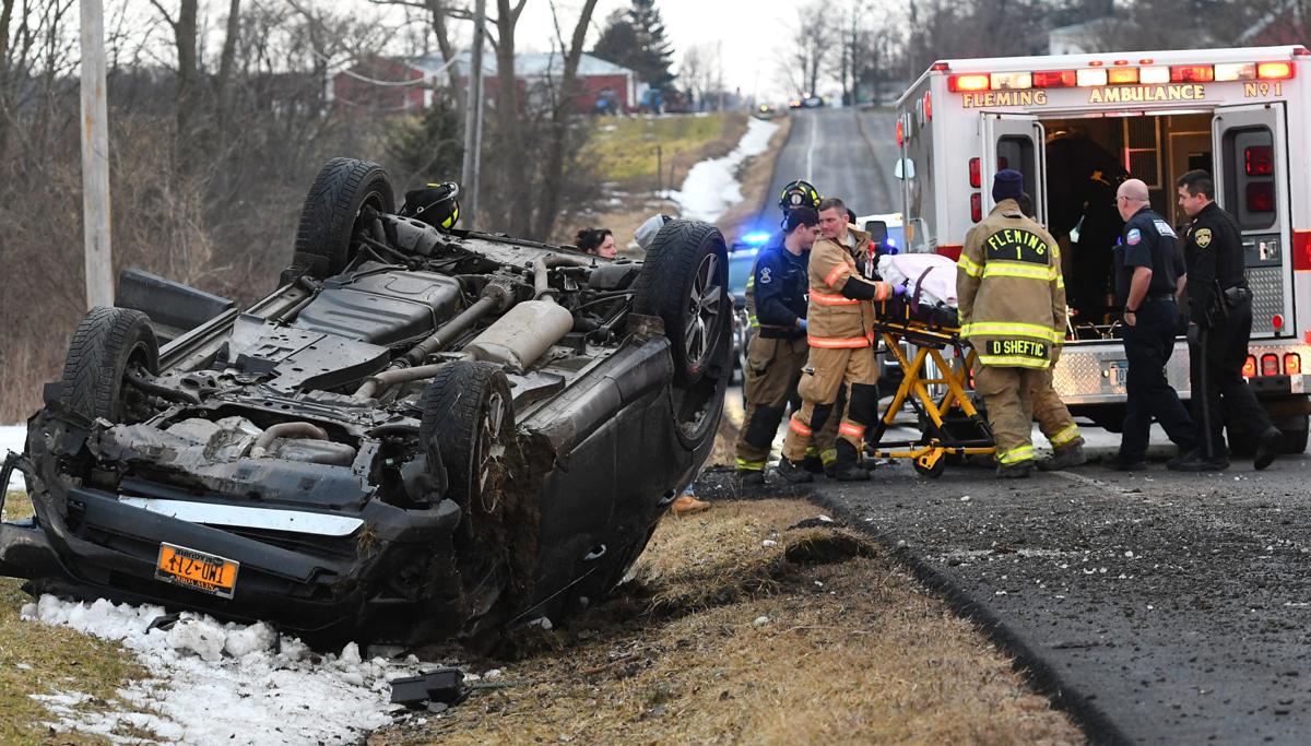 One woman transported to hospital after Fleming car crash