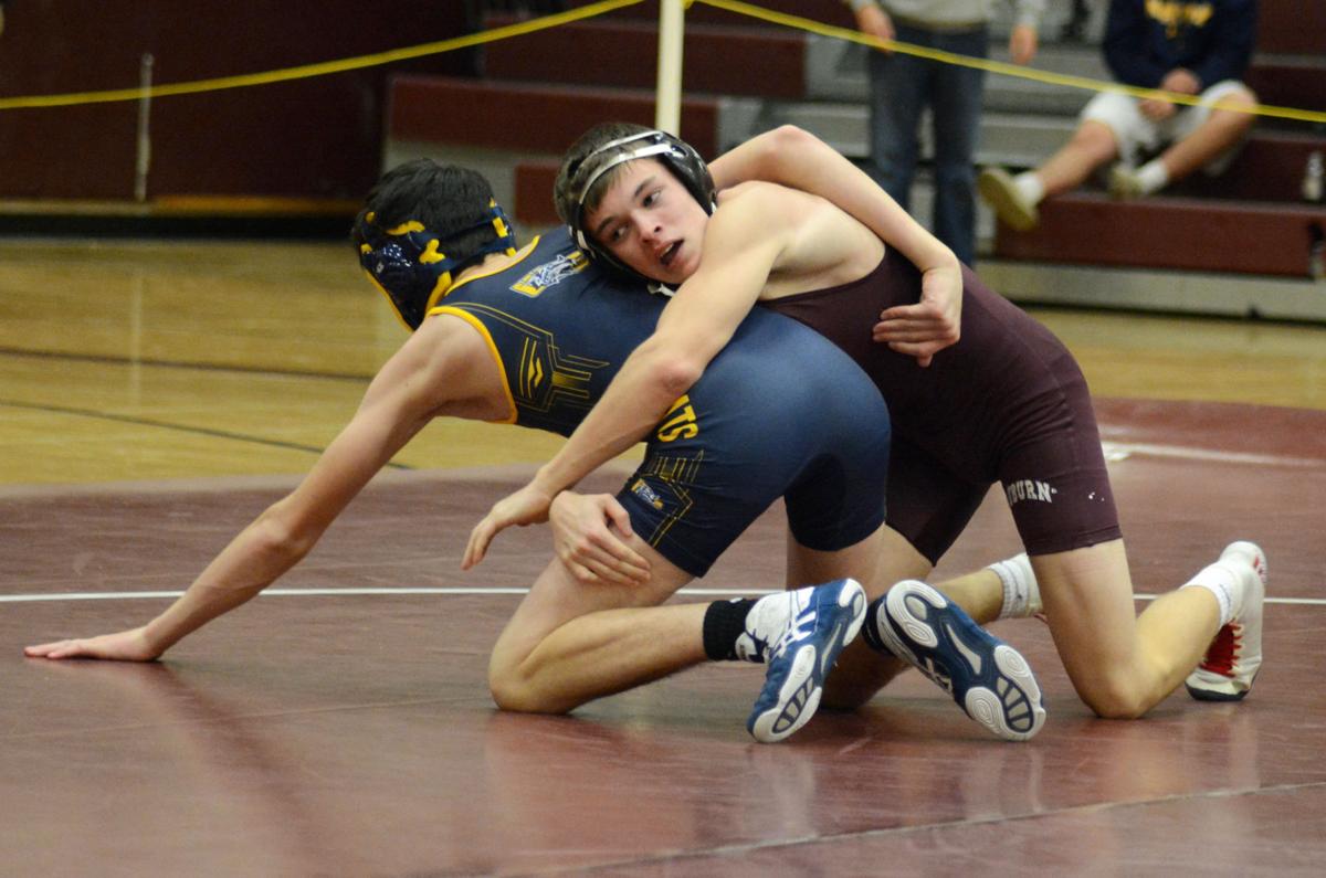 Auburn wrestling team wins eight matches in victory over West Genesee