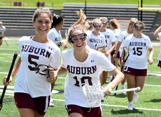 Auburn HS Girls Lacrosse - Girls sporting new ALL WHITE home game