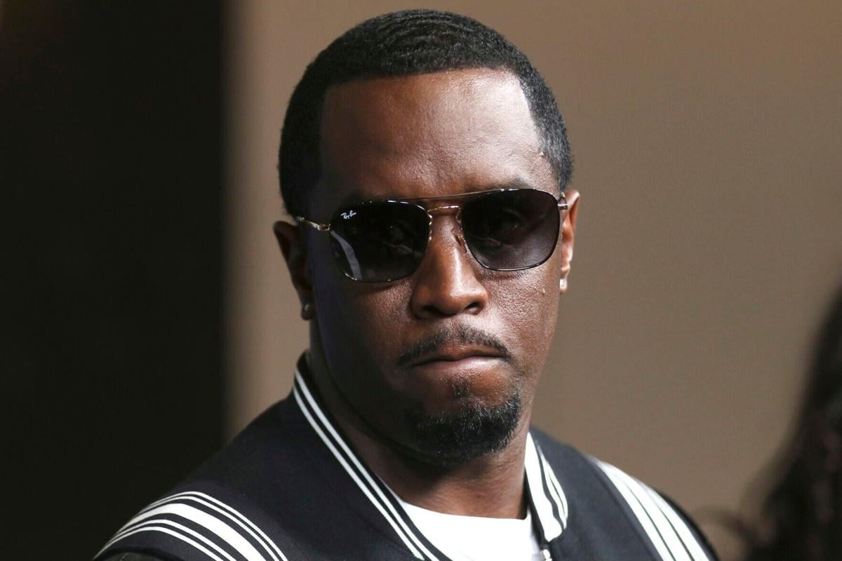 Diddy admits he beat ex girlfriend says he s sorry 