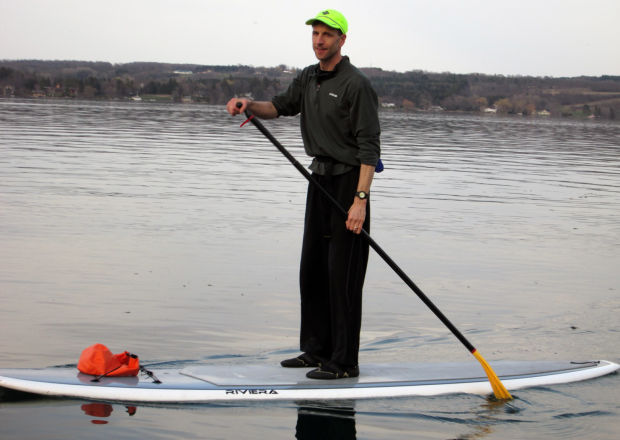 Lone Standup Paddleboarder Braves Icy Waters Of Skaneateles Lake