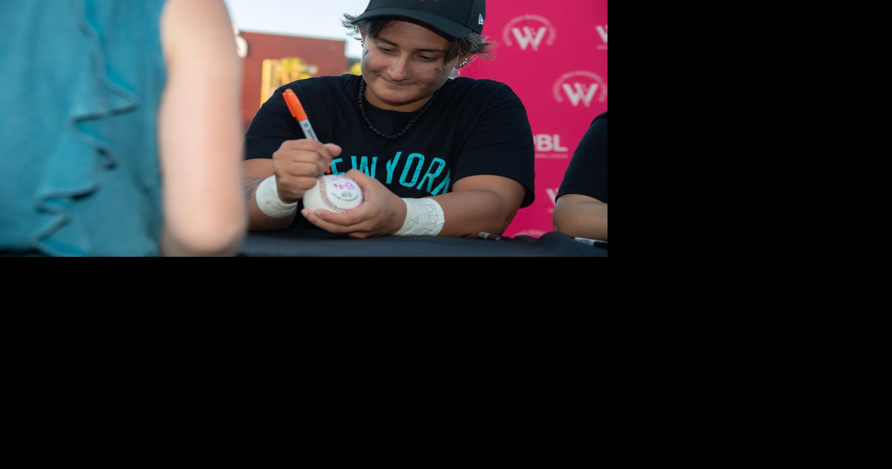 Women’s Pro Baseball League (WPBL) player Alyssa Zettlemoyer signs autographs after a demonstration practice at the Banner Island Ballpark in downtown Stockton on Jul. 2, 2026. The fledgling WPBL made a stop in Stockton as a part of its “Countdown Tour