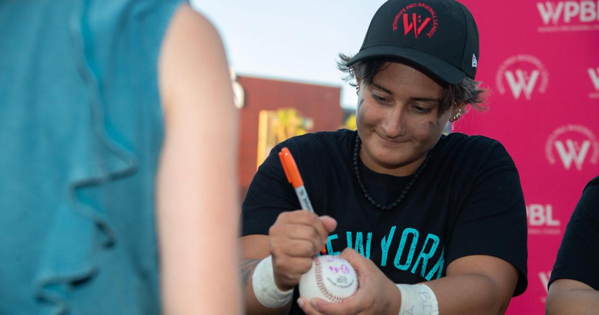 Women’s Pro Baseball League (WPBL) player Alyssa Zettlemoyer signs autographs after a demonstration practice at the Banner Island Ballpark in downtown Stockton on Jul. 2, 2026. The fledgling WPBL made a stop in Stockton as a part of its “Countdown Tour