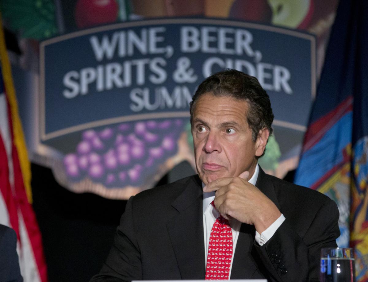 Cuomo OKs farm distilleries to sell other NY craft ...