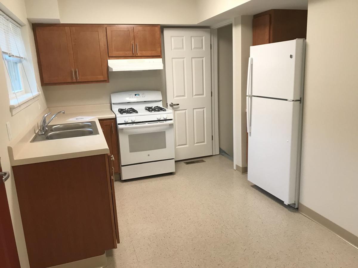 'Even better now' Residents move into newly renovated apartments at