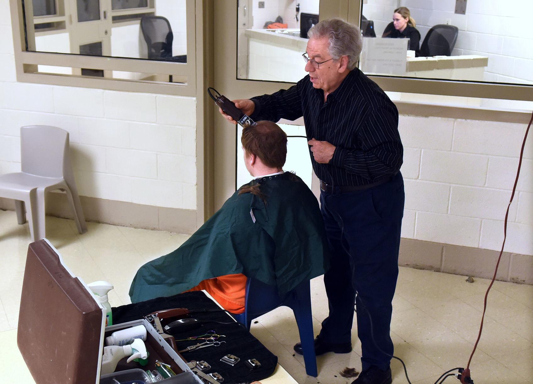 Barber behind bars Auburn's 'Mr. Paul' cuts hair at county jail